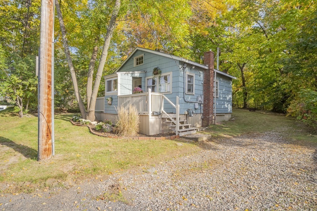 9 Nonantum Road Marblehead, MA 01945 - Photo 13 of 21 a view of a house with backyard and sitting area