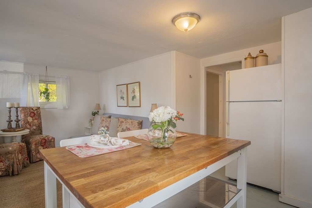 9 Nonantum Road Marblehead, MA 01945 - Photo 5 of 21 a dining room with a table and chairs