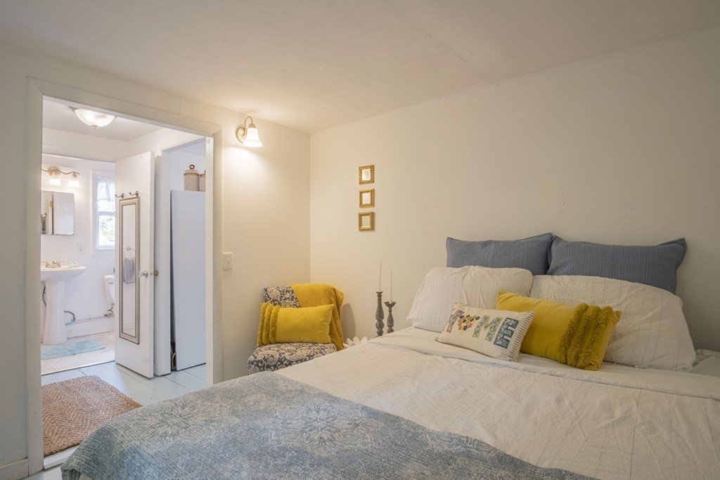 9 Nonantum Road Marblehead, MA 01945 - Photo 9 of 21 a bedroom with a bed and a couch