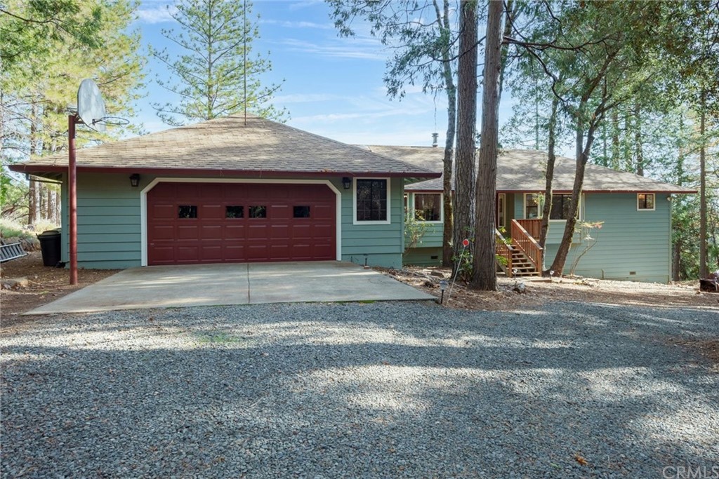 16526 Garland Road Forest Ranch, CA 95942 - Photo 1 of 1 Front of home with 2 car garage, circular driveway and RV Parking with Hook-Up