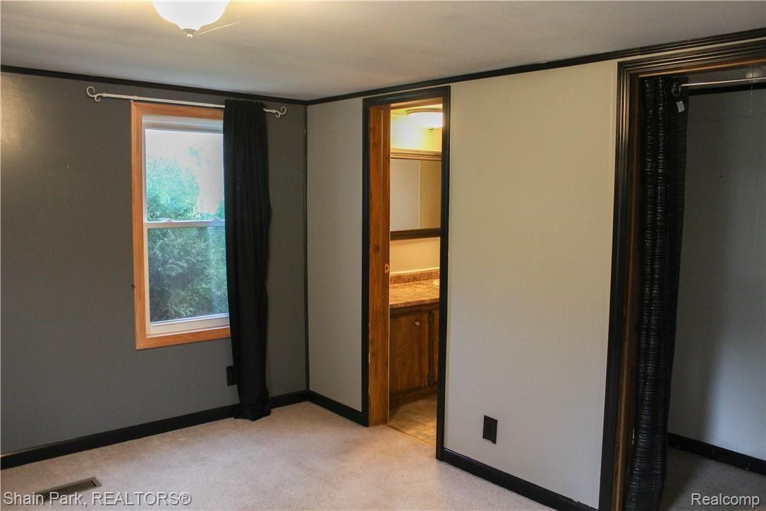 14676 Bryce Road Capac, MI 48014 - Photo 16 of 30 Walk in Closet and Master Bath