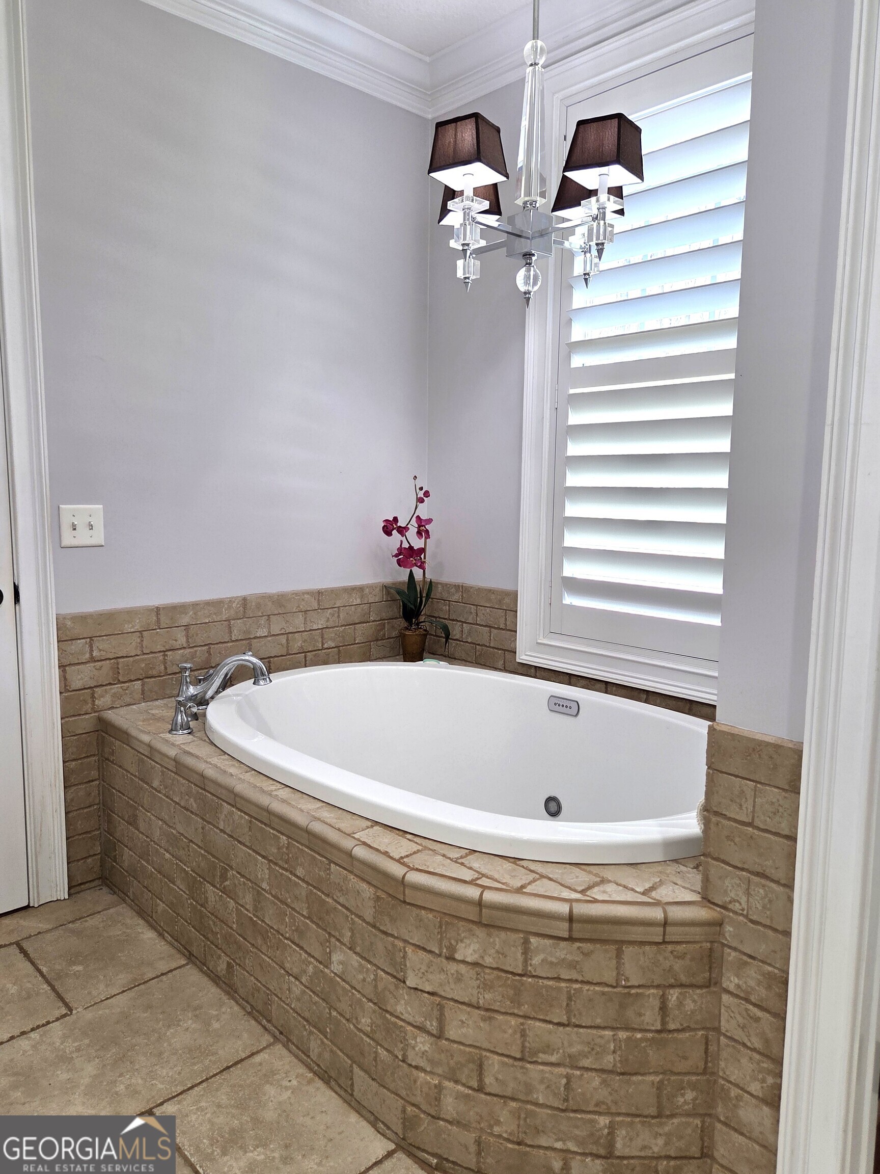 300 Hammond Powell Road Hazlehurst, GA 31539 - Photo 63 of 91 a bath tub sitting in a bathroom next to a window