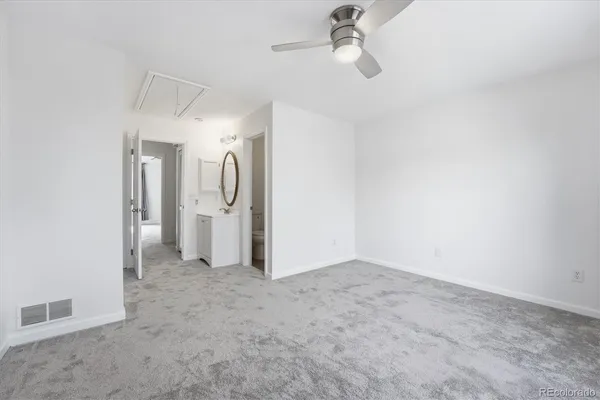 an empty room with a bathroom