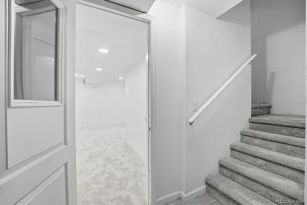 a view of entryway with wooden floor