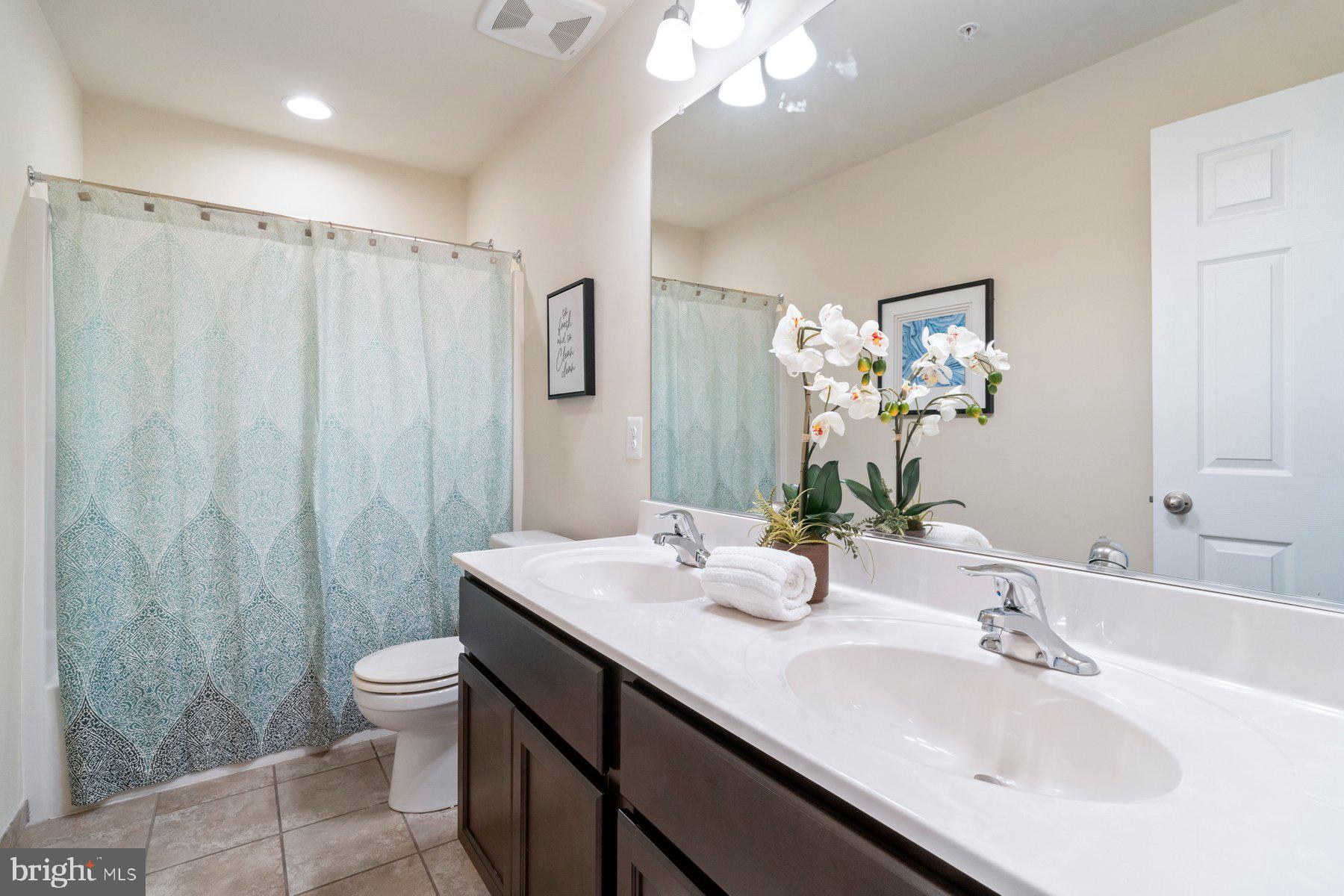6709 Oakridge Road New Market, MD 21774 - Photo 30 of 53 Hall bath with double vanities