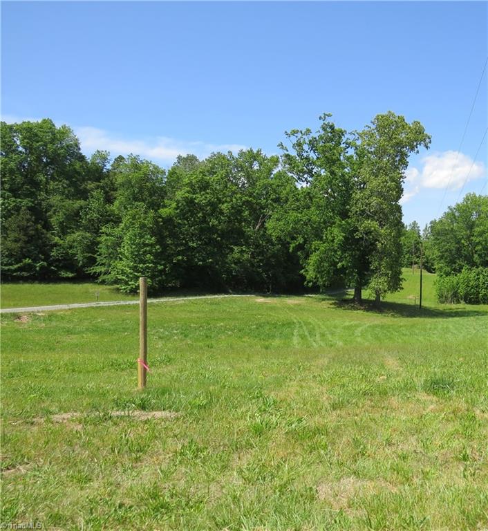 5765 Chrismon Road Browns Summit, NC 27214 - Photo 4 of 10 This is the view from the street where the driveway would be installed by the new owner.