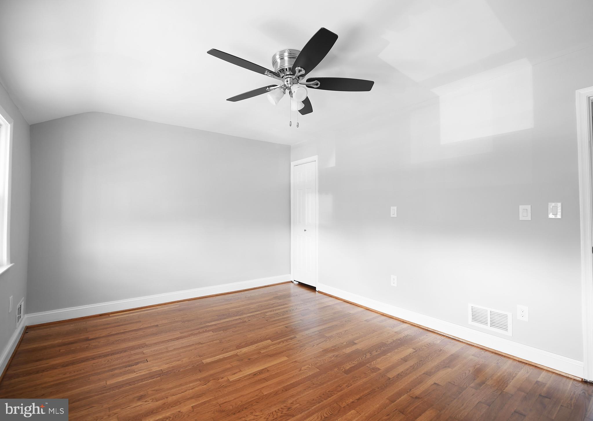 8106 Kavanagh Road Baltimore, MD 21222 - Photo 15 of 24 Bedroom 2 with closet and ceiling fan