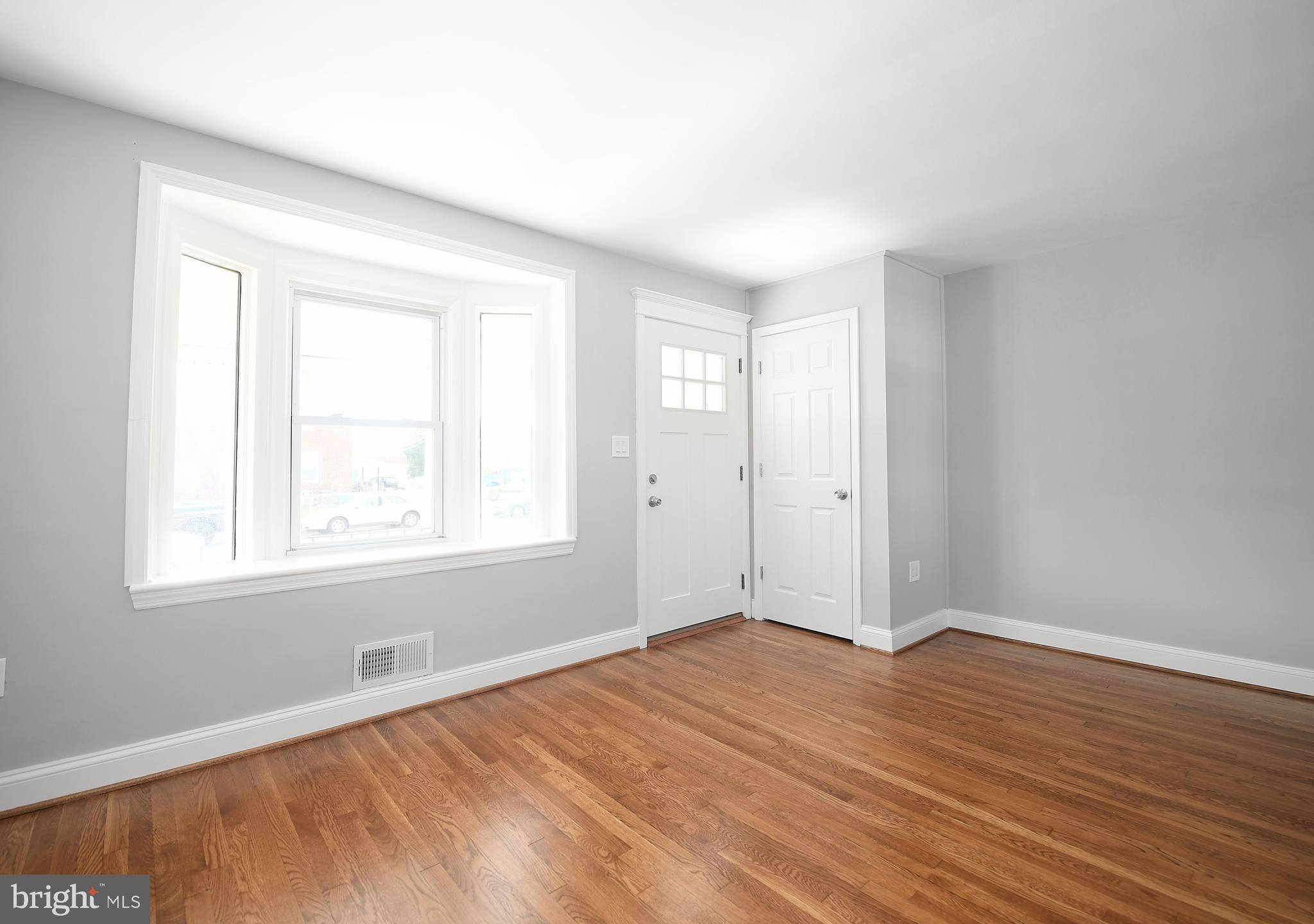 8106 Kavanagh Road Baltimore, MD 21222 - Photo 3 of 24 Newly finished hardwood floors