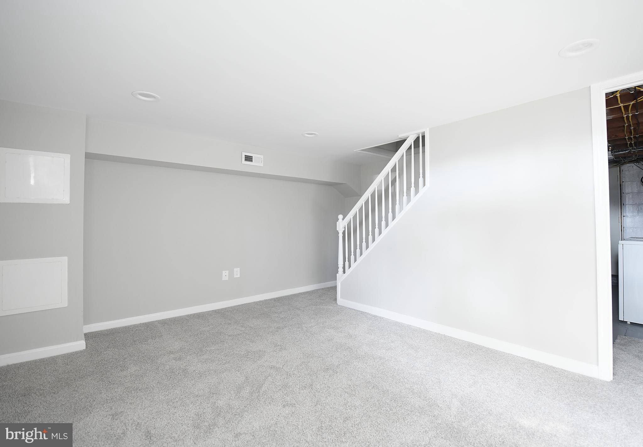 8106 Kavanagh Road Baltimore, MD 21222 - Photo 4 of 24 Plush carpeted lower-level