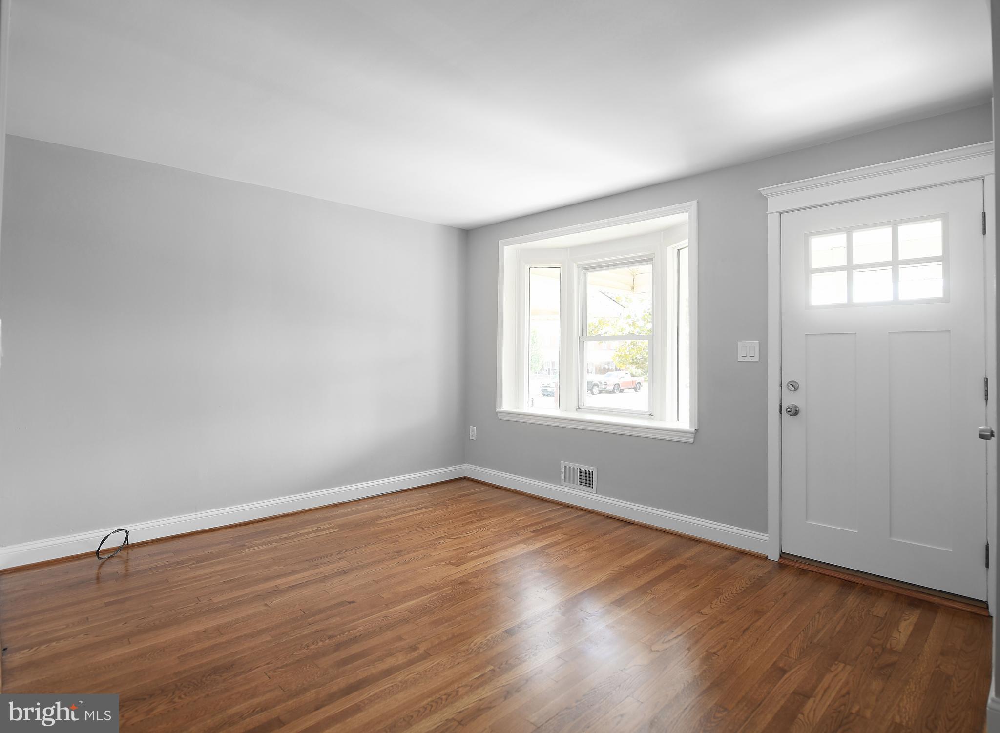 8106 Kavanagh Road Baltimore, MD 21222 - Photo 7 of 24 Living area with bay window