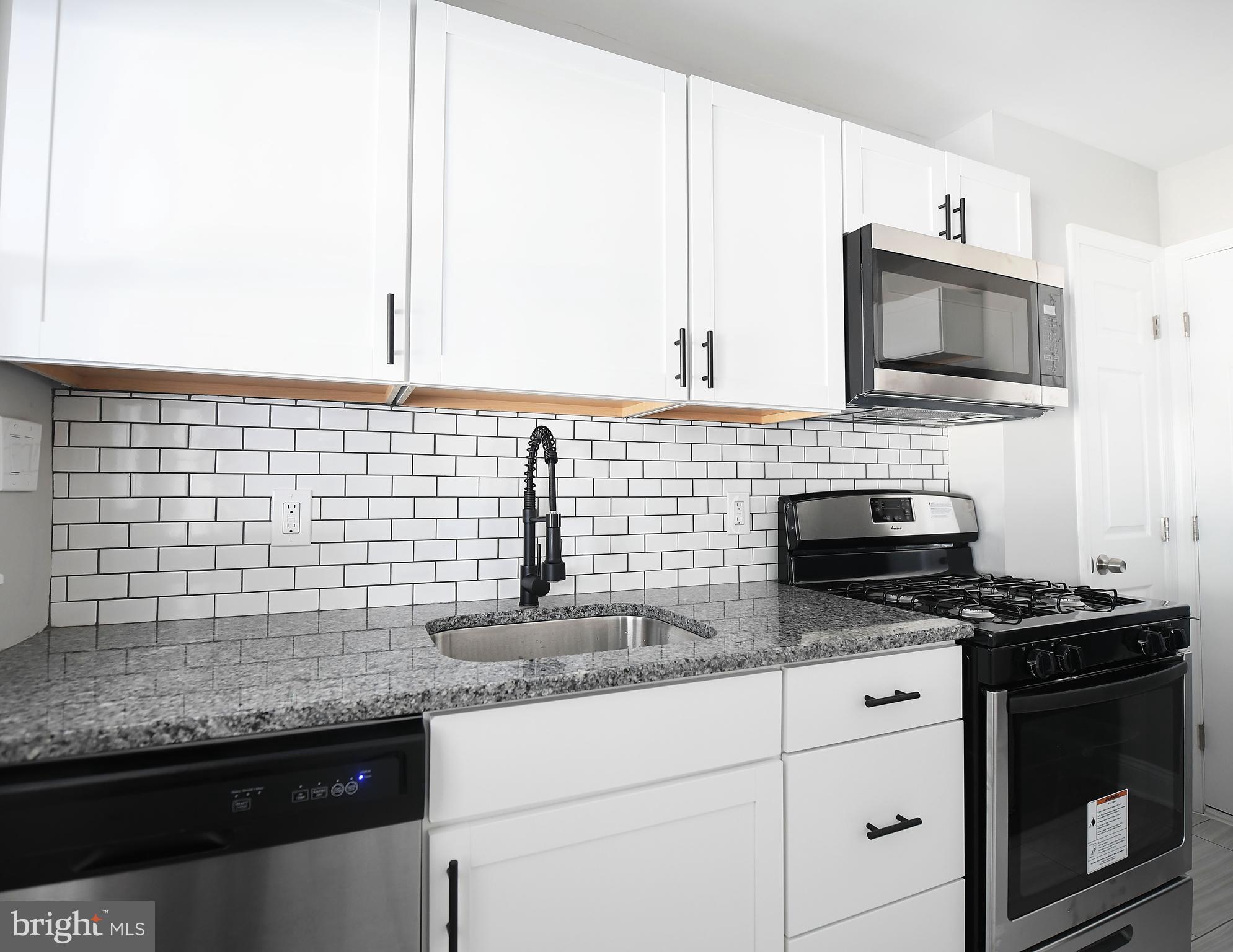8106 Kavanagh Road Baltimore, MD 21222 - Photo 8 of 24 Modern appliances and black matte fixtures