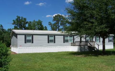 44539 Swallowfork Avenue Callahan, FL 32011 - Photo 1 of 1 front view of house with a yard