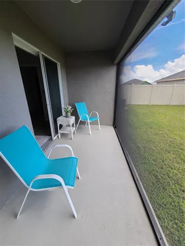 a view of a garden with an apartment