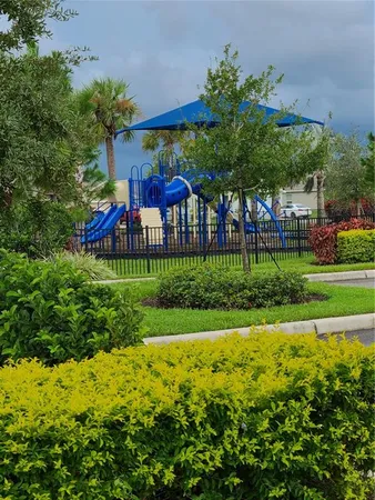 front view of a house with a garden
