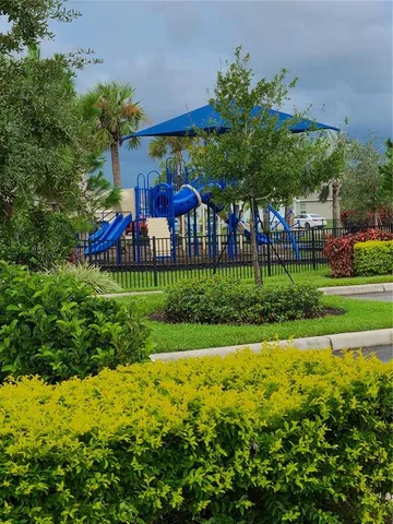 front view of a house with a garden
