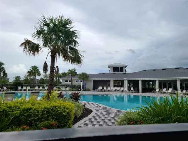 a view of a park and entertaining space