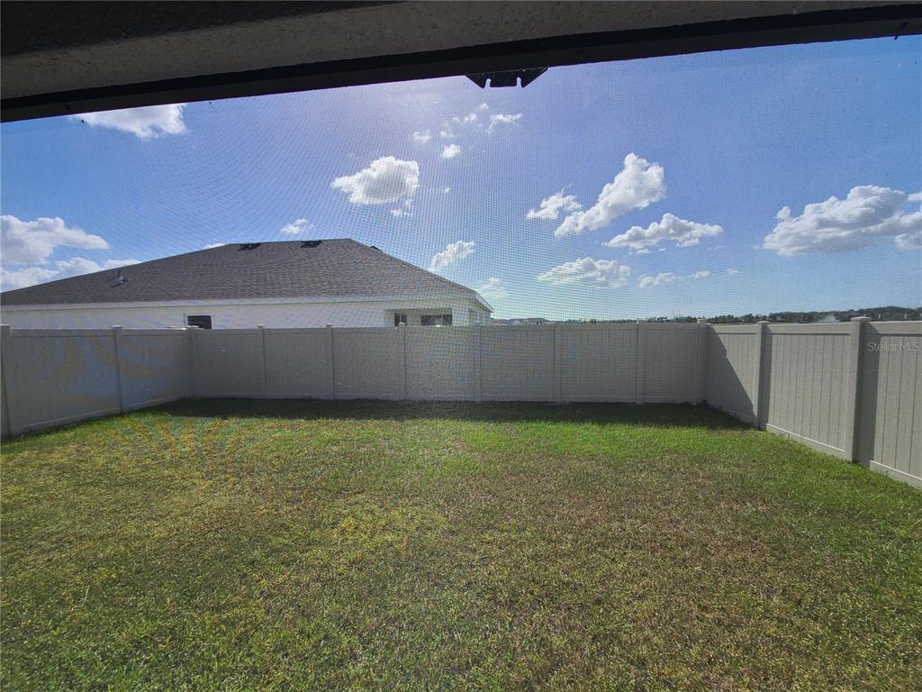 10209 Kalamazoo Place Parrish, FL 34219 - Photo 24 of 25 a view of a room with a kitchen