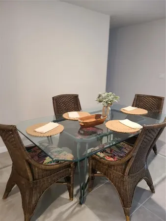 a view of a dining room with furniture