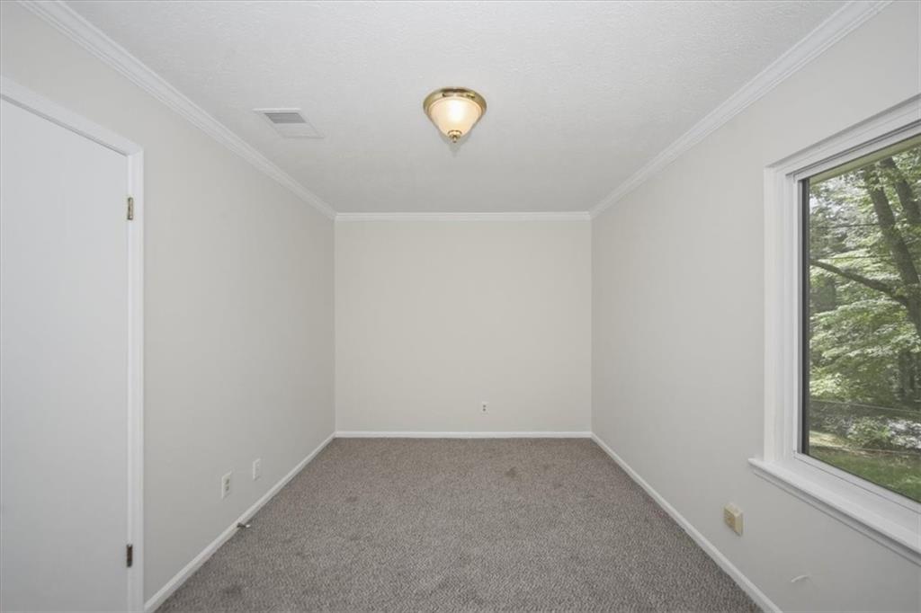 142 Deer Run Canton, GA 30114 - Photo 7 of 24 a view of a small space with a window