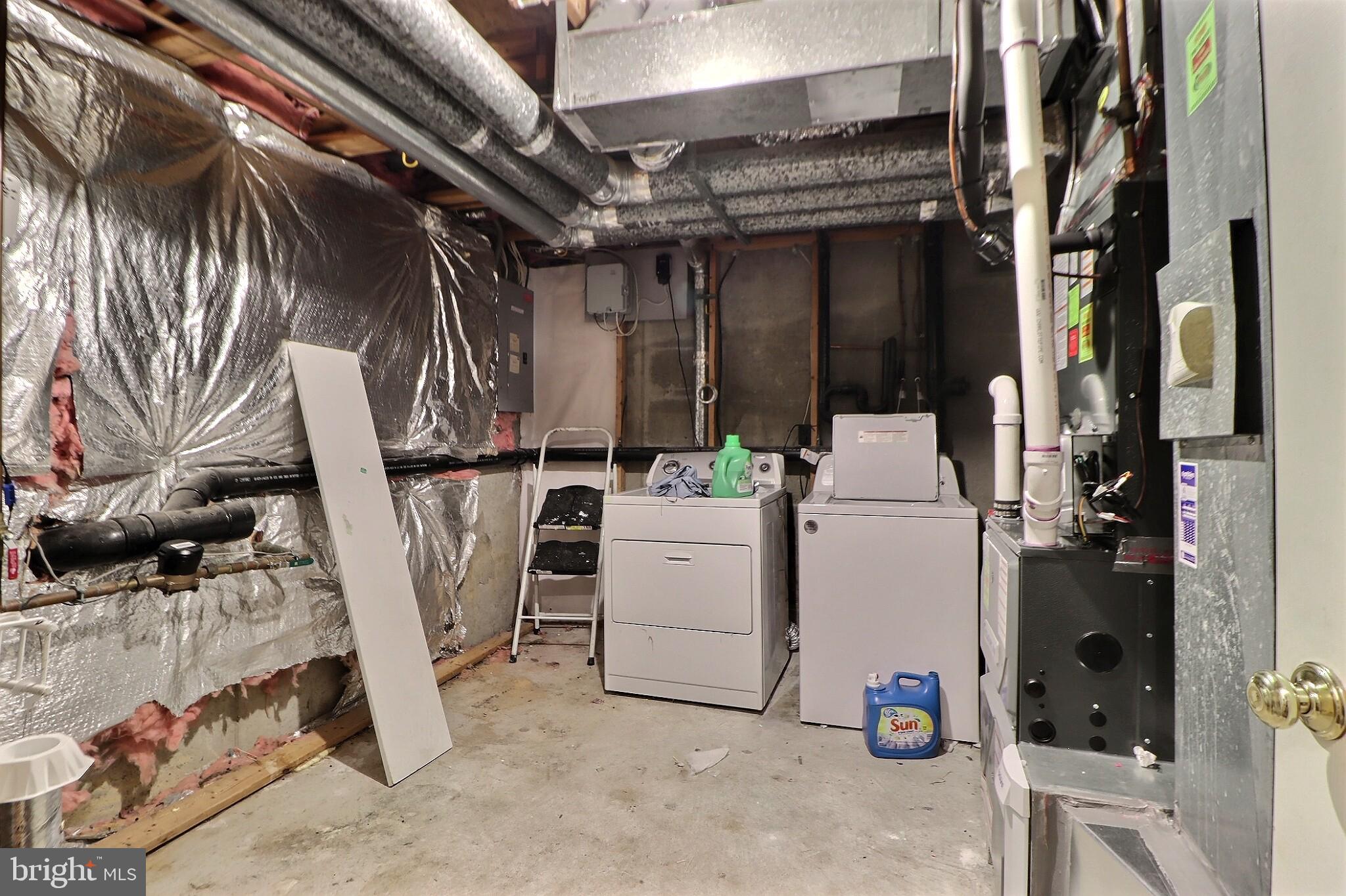 6 Regency Drive Mount Holly, NJ 08060 - Photo 15 of 27 Functional laundry space with utility access.