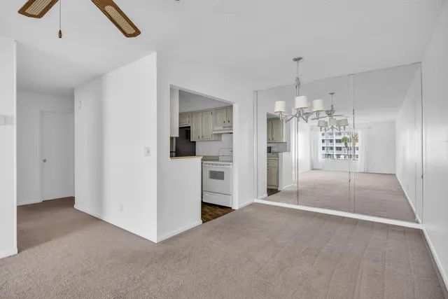 a kitchen with a sink stove and refrigerator