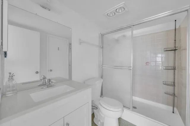 a view of a lake with a large building