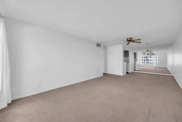 a view of a livingroom and a window