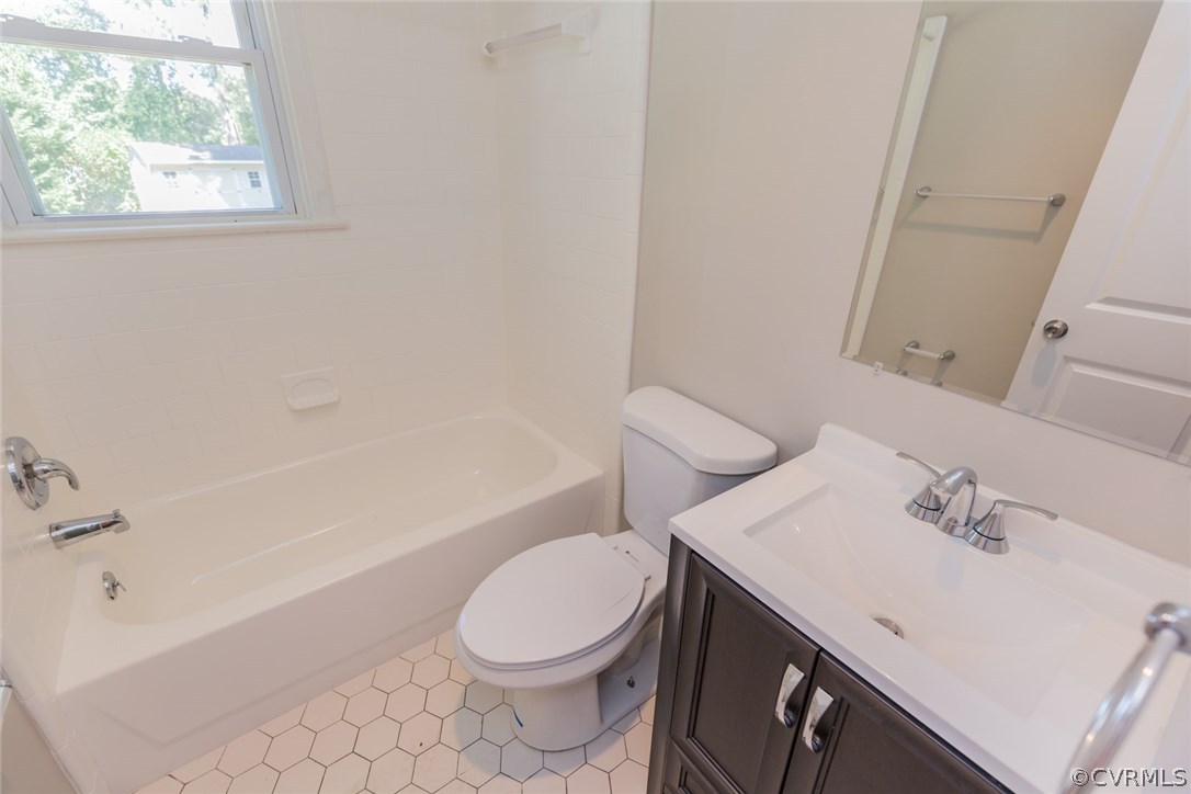3522 West Hundred Road Chester, VA 23831 - Photo 16 of 29 a bathroom with a sink a toilet and bathtub