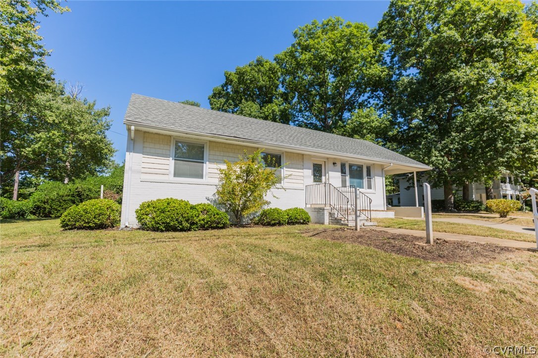 3522 West Hundred Road Chester, VA 23831 - Photo 2 of 29 a front view of house with yard and green space