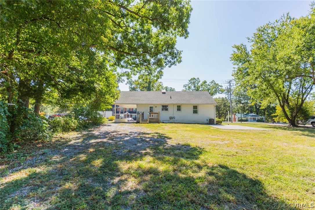 3522 West Hundred Road Chester, VA 23831 - Photo 25 of 29 a front view of house with yard and trees
