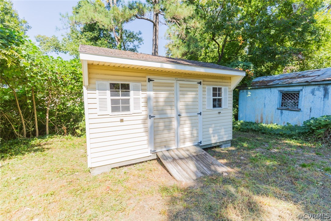 3522 West Hundred Road Chester, VA 23831 - Photo 28 of 29 a view of a house with a small yard and large tree