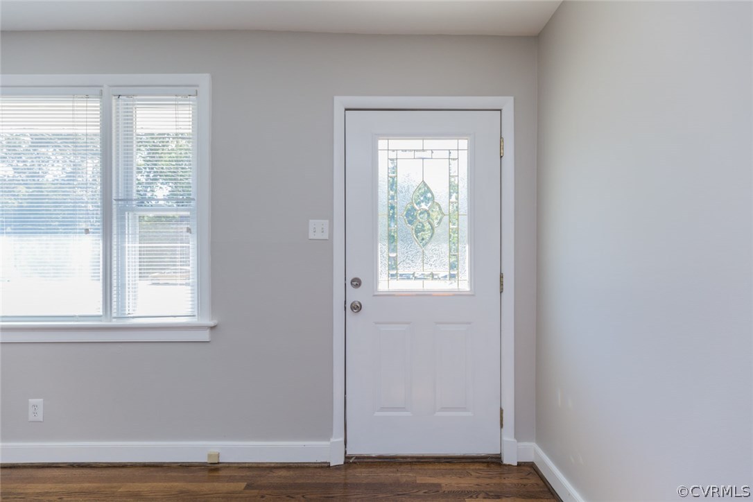 3522 West Hundred Road Chester, VA 23831 - Photo 4 of 29 a view of an empty room with wooden floor and a window