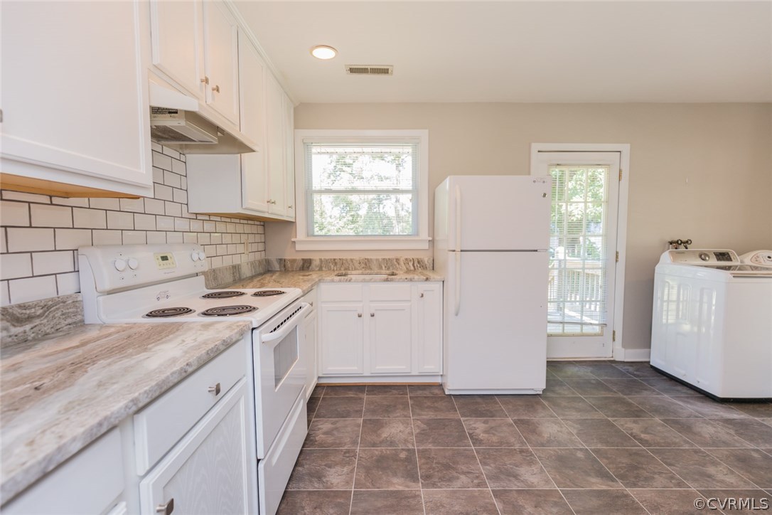 3522 West Hundred Road Chester, VA 23831 - Photo 8 of 29 a kitchen with a white stove top oven and refrigerator