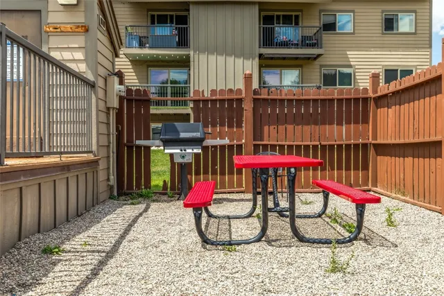 a view of city with wooden deck