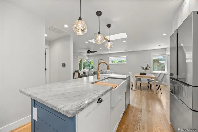 a kitchen with a table and chairs in it