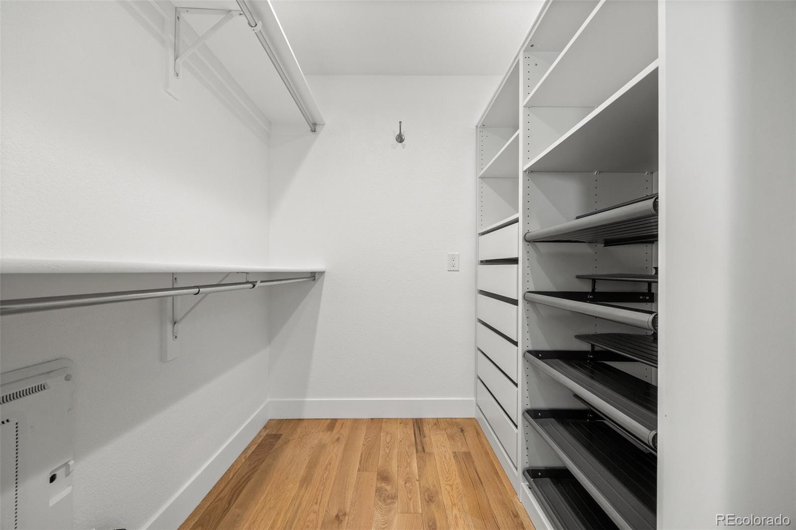 2577 Depew Street Edgewater, CO 80214 - Photo 21 of 47 a view of walk in closet with empty racks