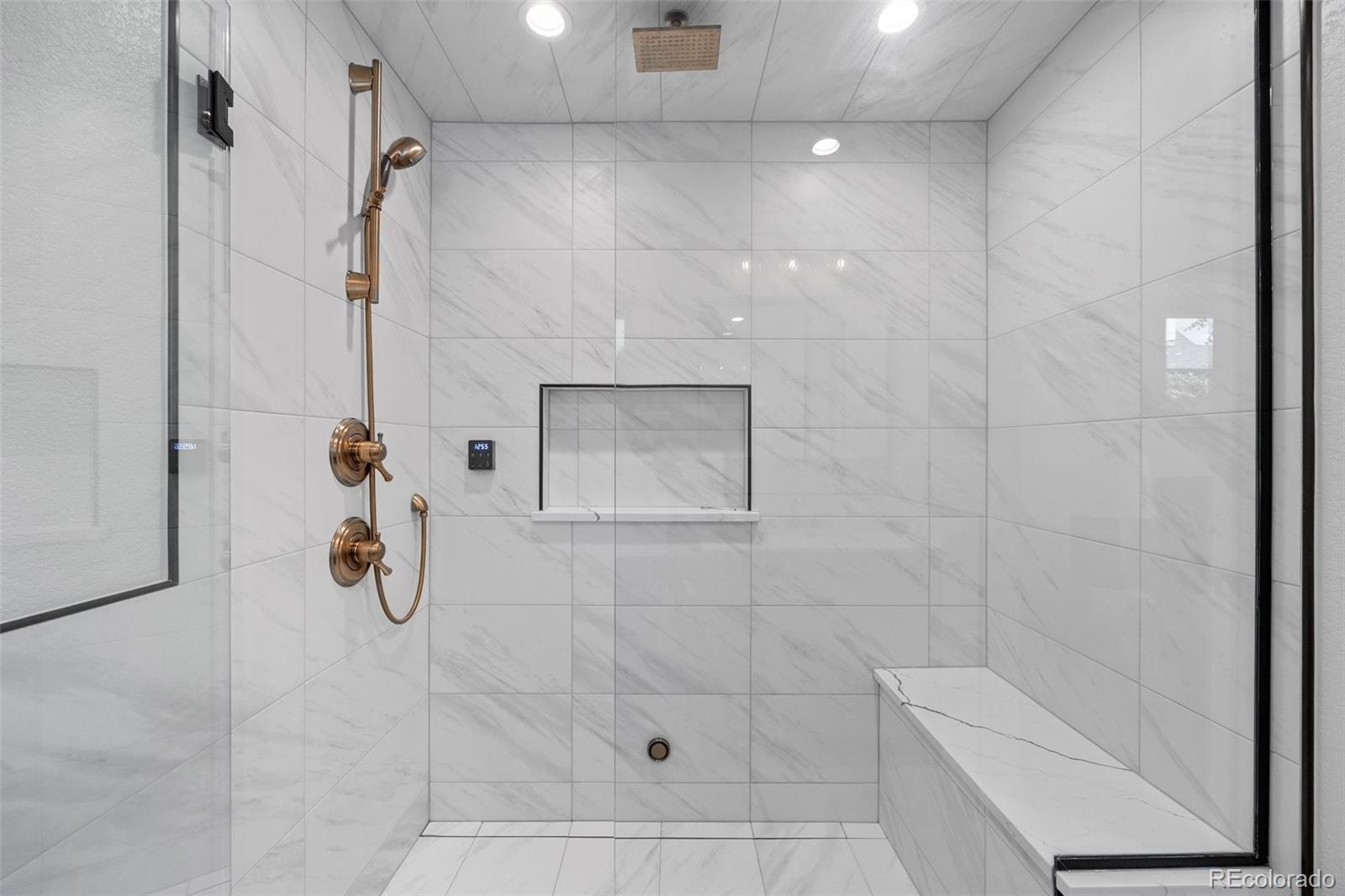 2577 Depew Street Edgewater, CO 80214 - Photo 23 of 47 a bathroom with a shower