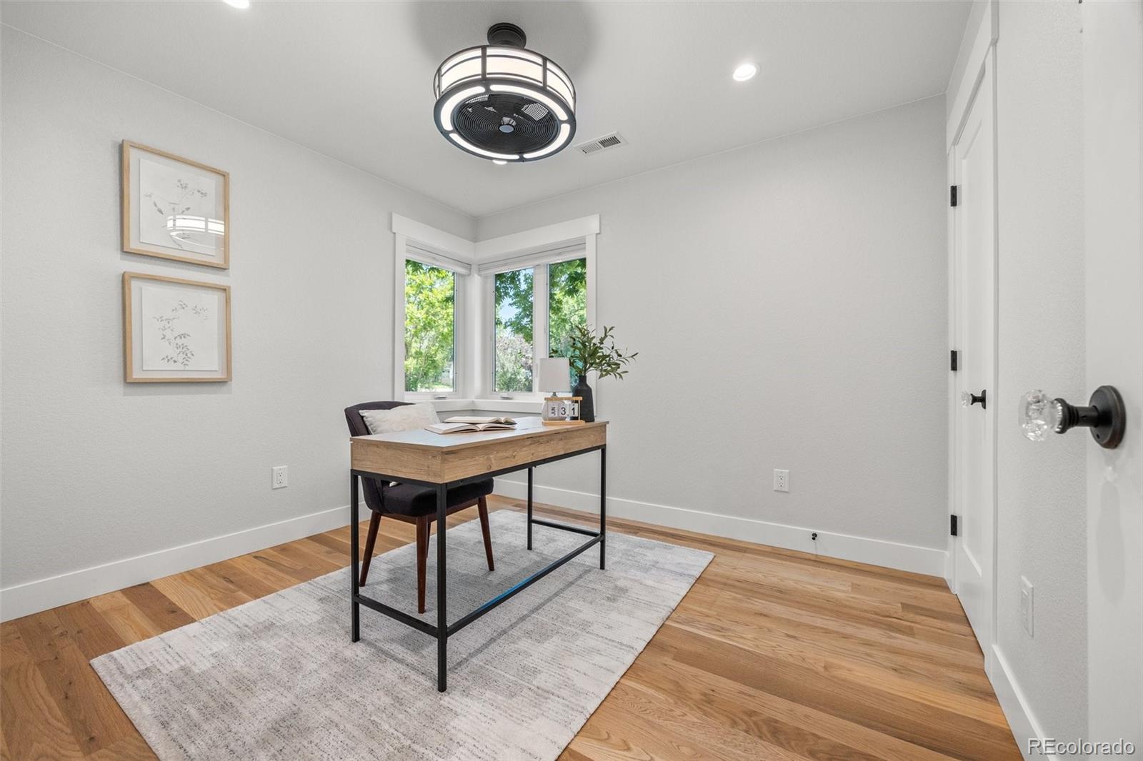 2577 Depew Street Edgewater, CO 80214 - Photo 24 of 47 a view of a room with gym equipment