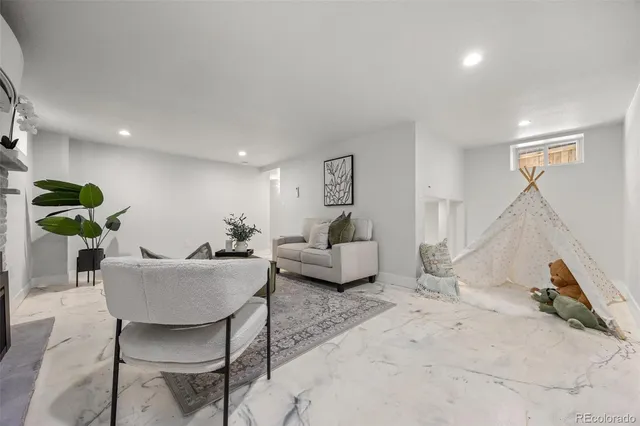 a living room with furniture and a couch