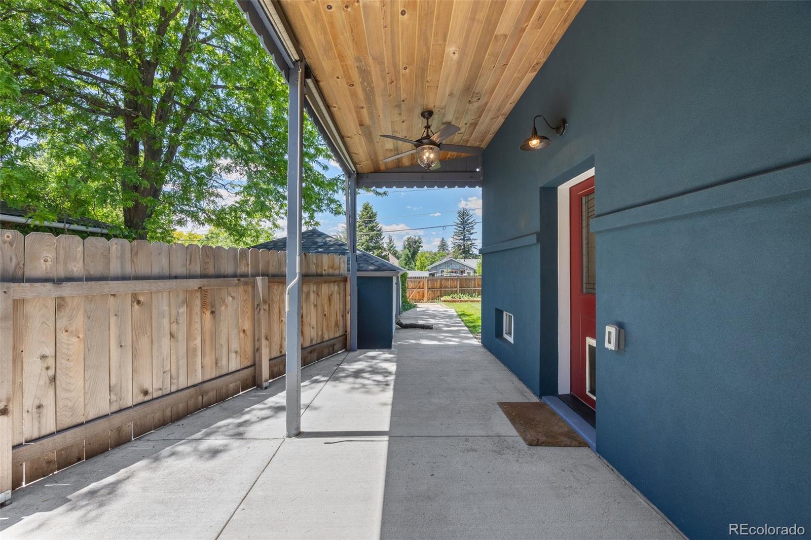 2577 Depew Street Edgewater, CO 80214 - Photo 38 of 47 a view of a porch with wooden fence