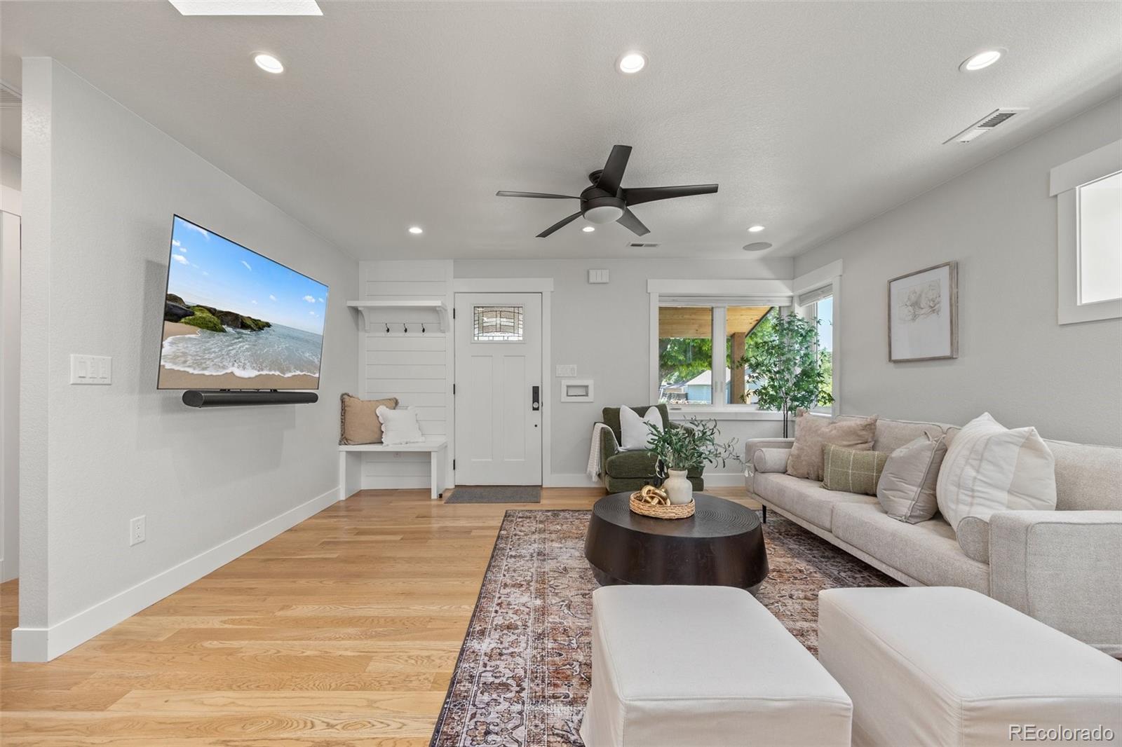 2577 Depew Street Edgewater, CO 80214 - Photo 5 of 47 a living room with furniture and a large window