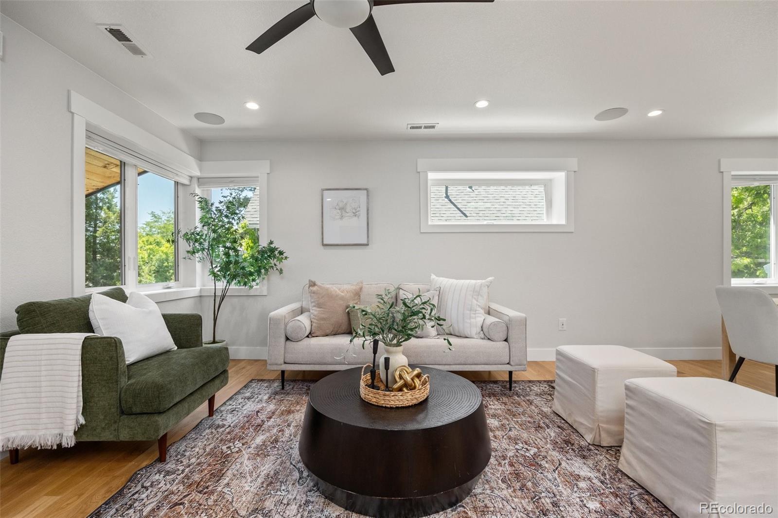 2577 Depew Street Edgewater, CO 80214 - Photo 7 of 47 a living room with furniture potted plant and window
