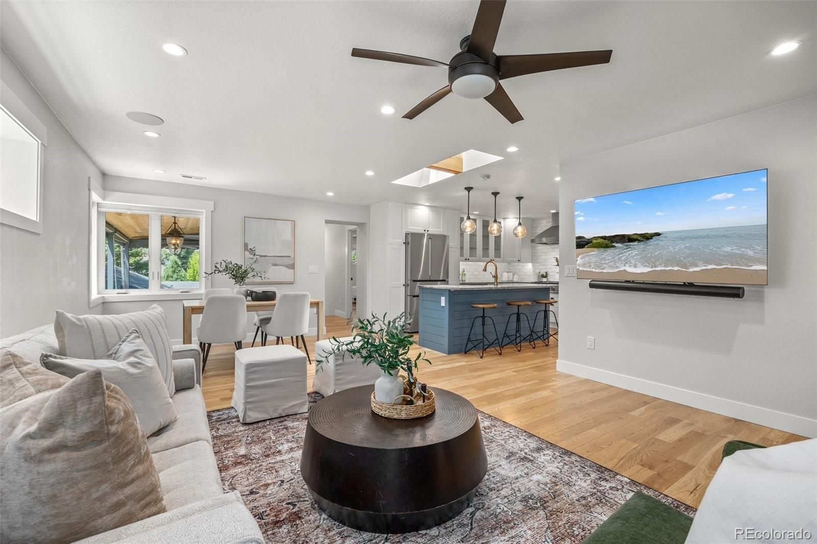 2577 Depew Street Edgewater, CO 80214 - Photo 9 of 47 a living room with furniture and a large window
