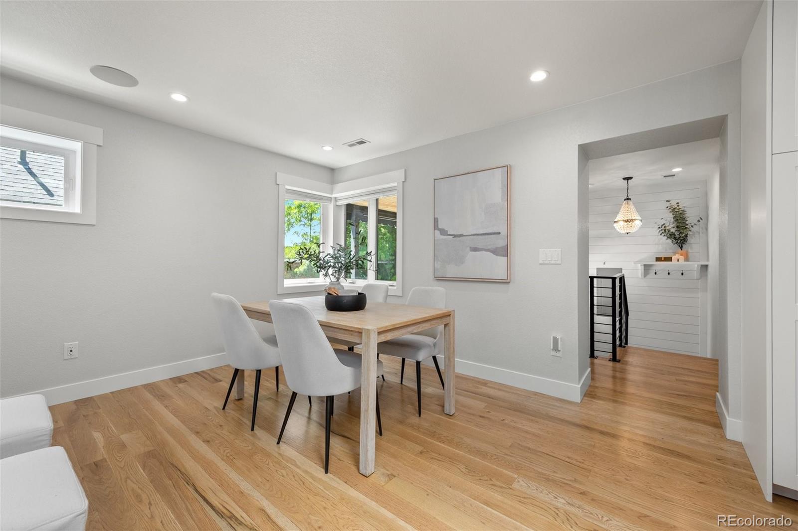 2577 Depew Street Edgewater, CO 80214 - Photo 10 of 47 a view of a dining room with furniture window and wooden floor