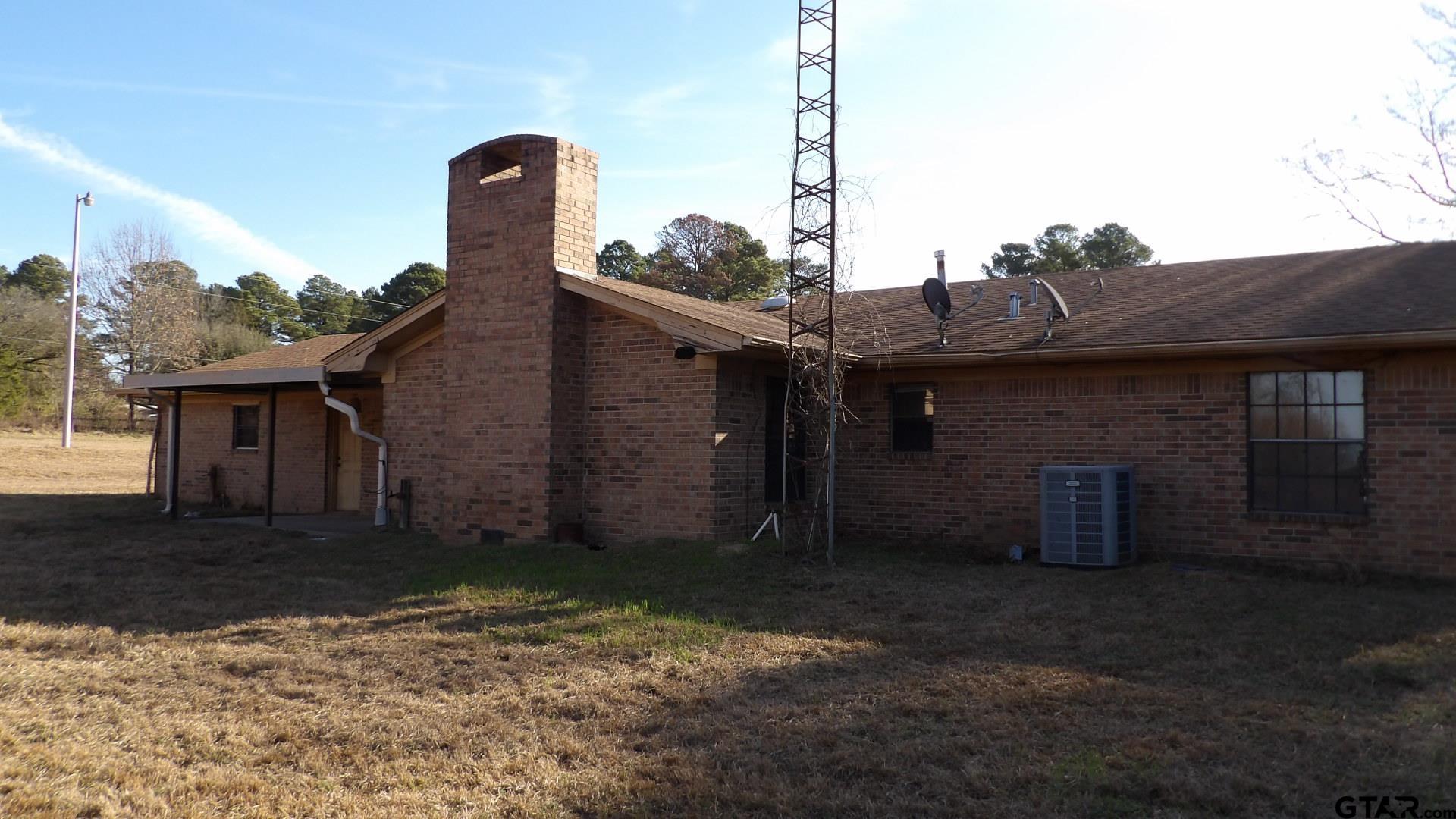 705 Wiley Boulevard Big Sandy, TX 75755 - Photo 16 of 17 a front view of a house with garden
