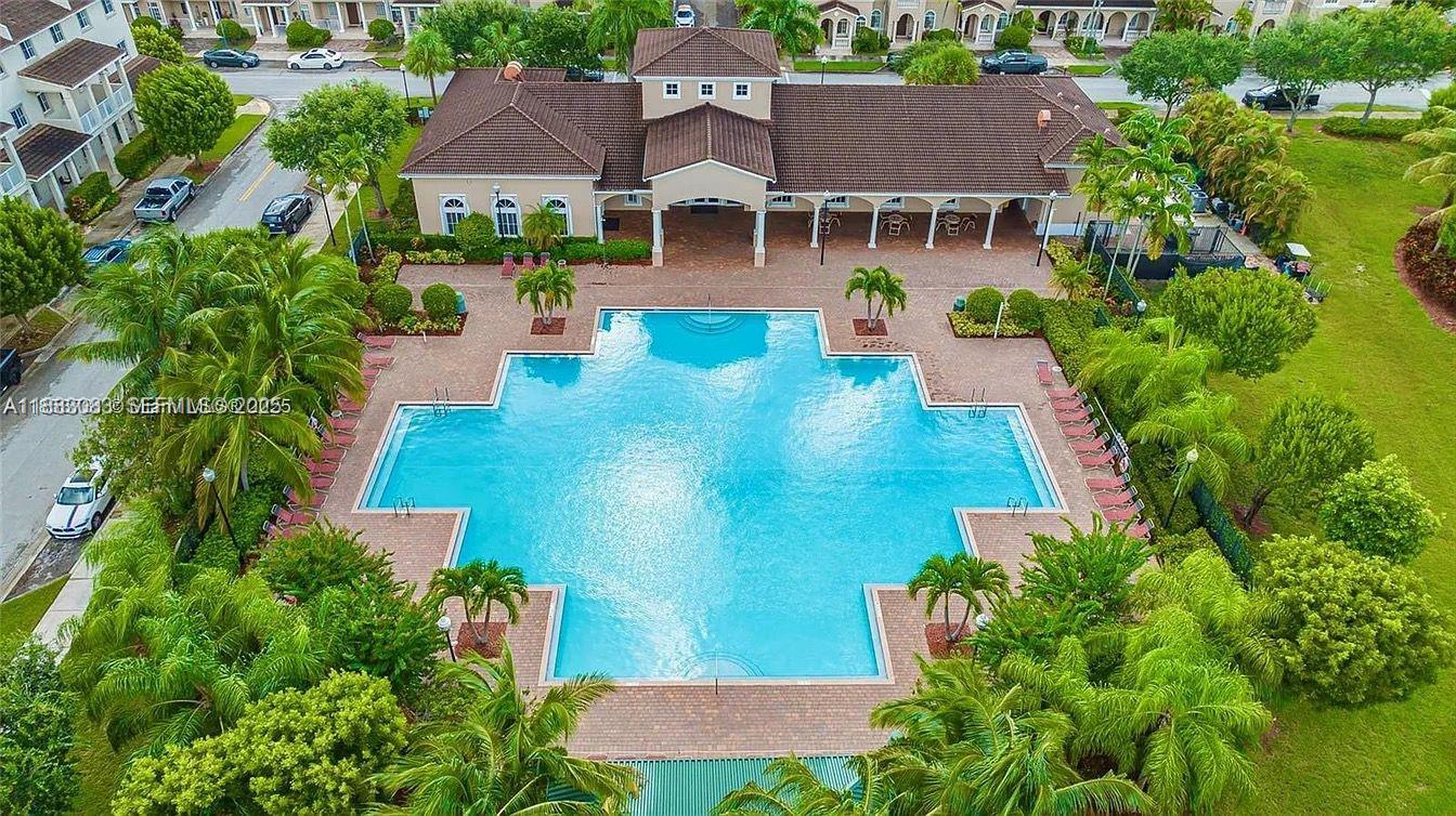 27841 Southwest 140th Avenue Homestead, FL 33032 - Photo 27 of 28 an aerial view of a house with yard swimming pool and outdoor seating