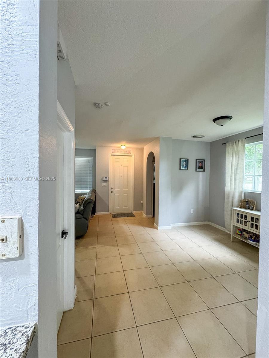 27841 Southwest 140th Avenue Homestead, FL 33032 - Photo 5 of 28 a view of a livingroom with a furniture