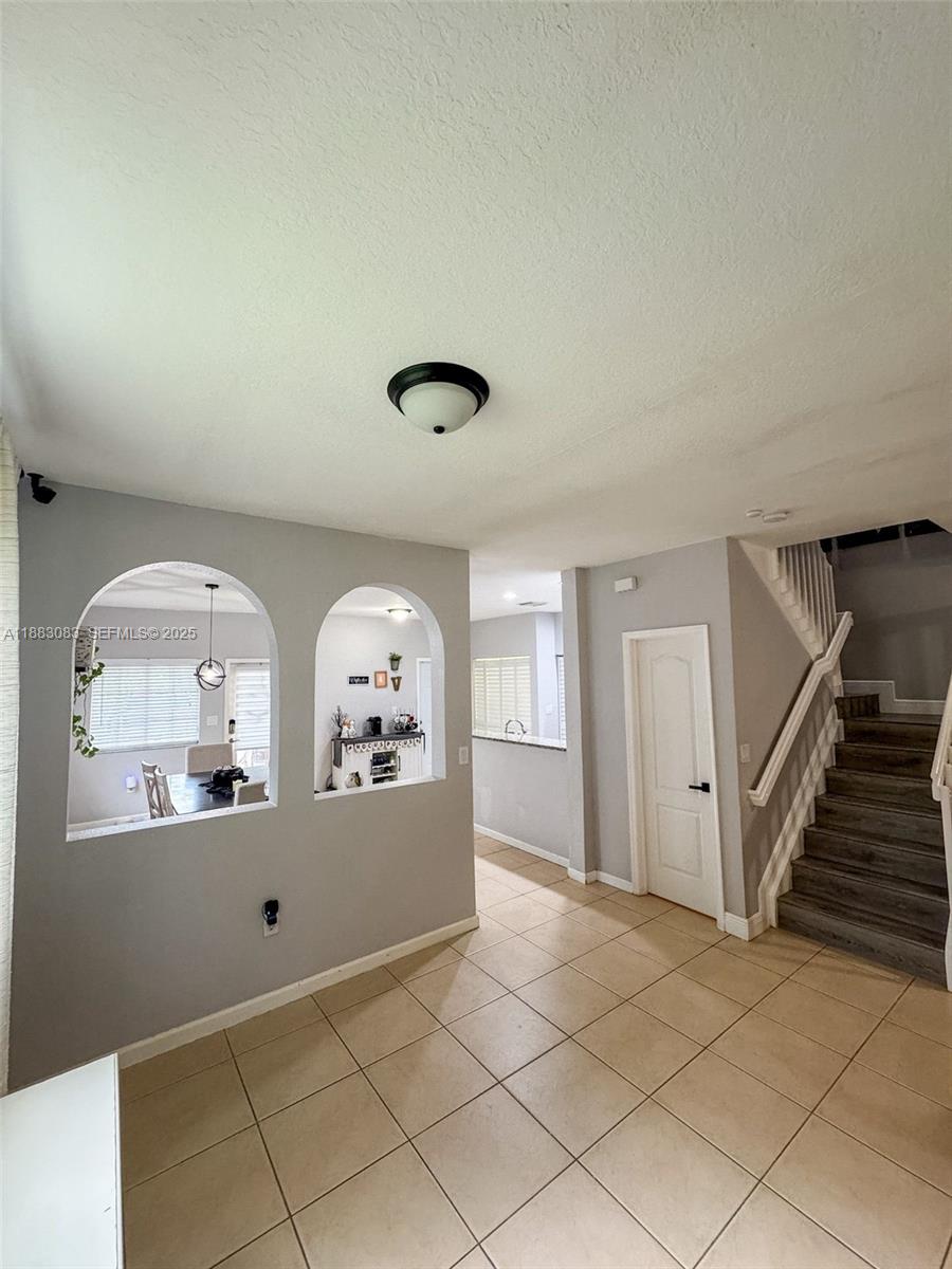 27841 Southwest 140th Avenue Homestead, FL 33032 - Photo 9 of 28 a view of a livingroom with furniture and window
