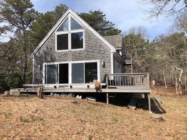 59 Dike Road Edgartown, MA 02539 - Photo 4 of 5 a view of house with yard outdoor seating