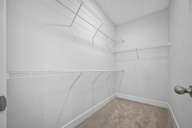 a view of kitchen with sink microwave refrigerator and stove